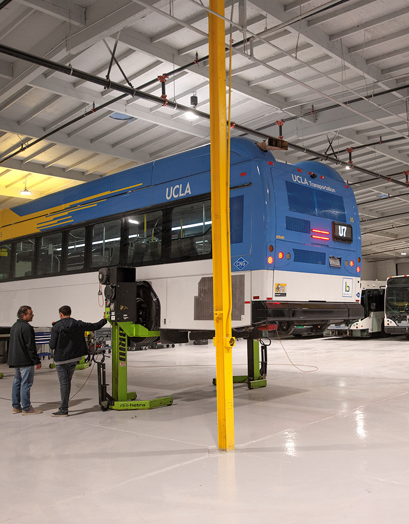 UCLA fleet bus on jacks at Nationwide Transit, Torrance California